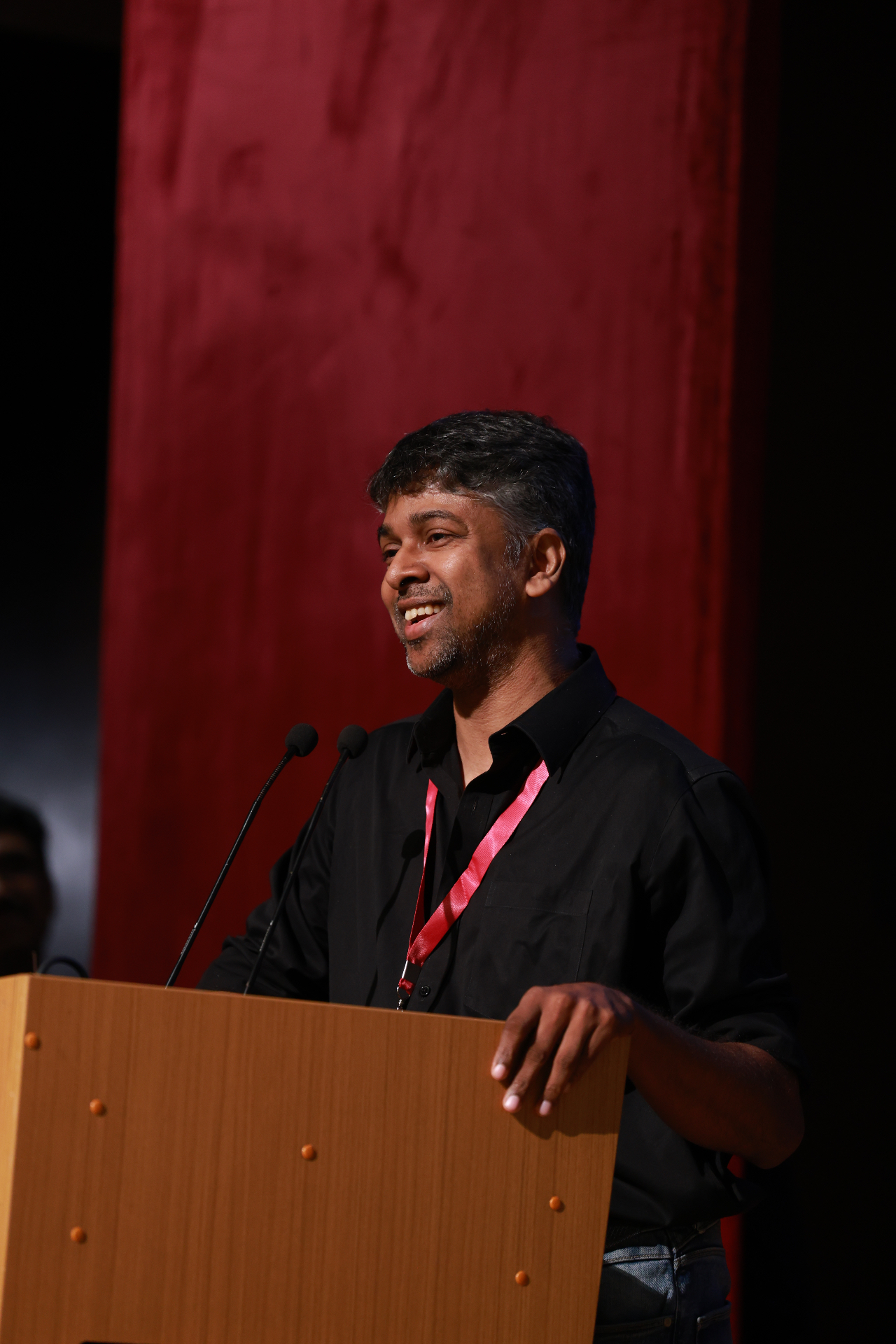 Student pitching on stage